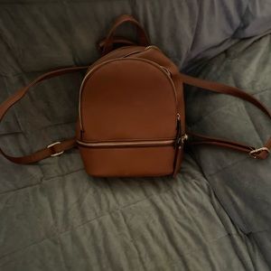 Small plain brown backpack